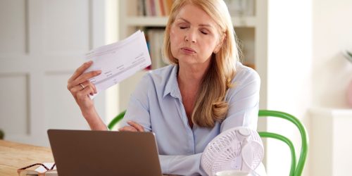 Women dealing with hotflashes looking for natural health solutions online.